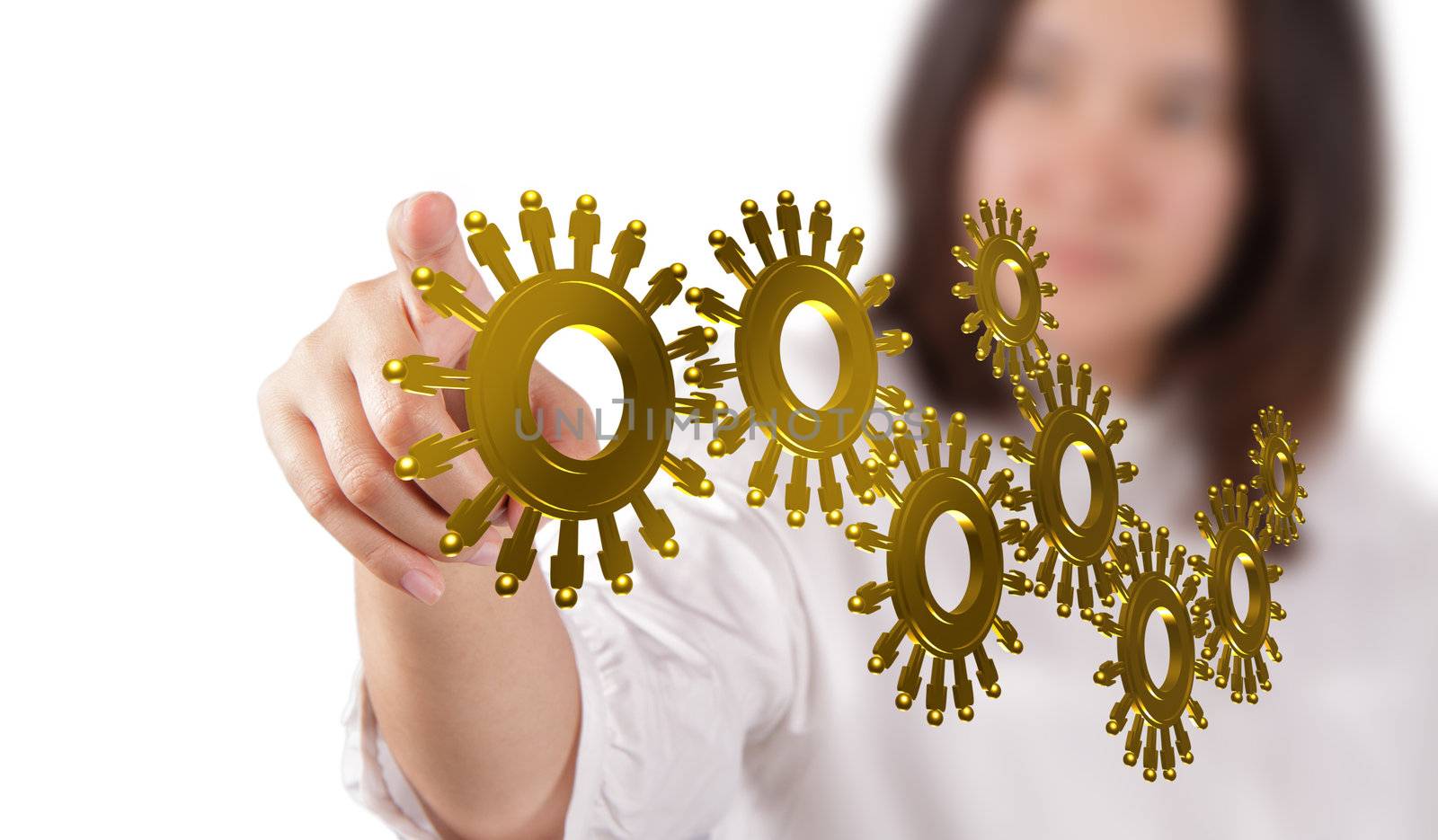 businesswoman hand and gold people cogs as concept