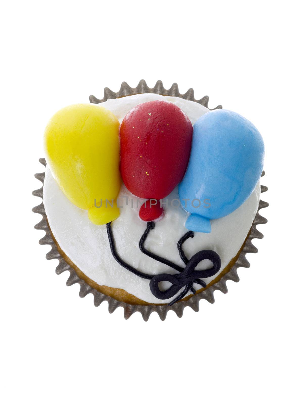 Cupcake with fondant balloon toppings