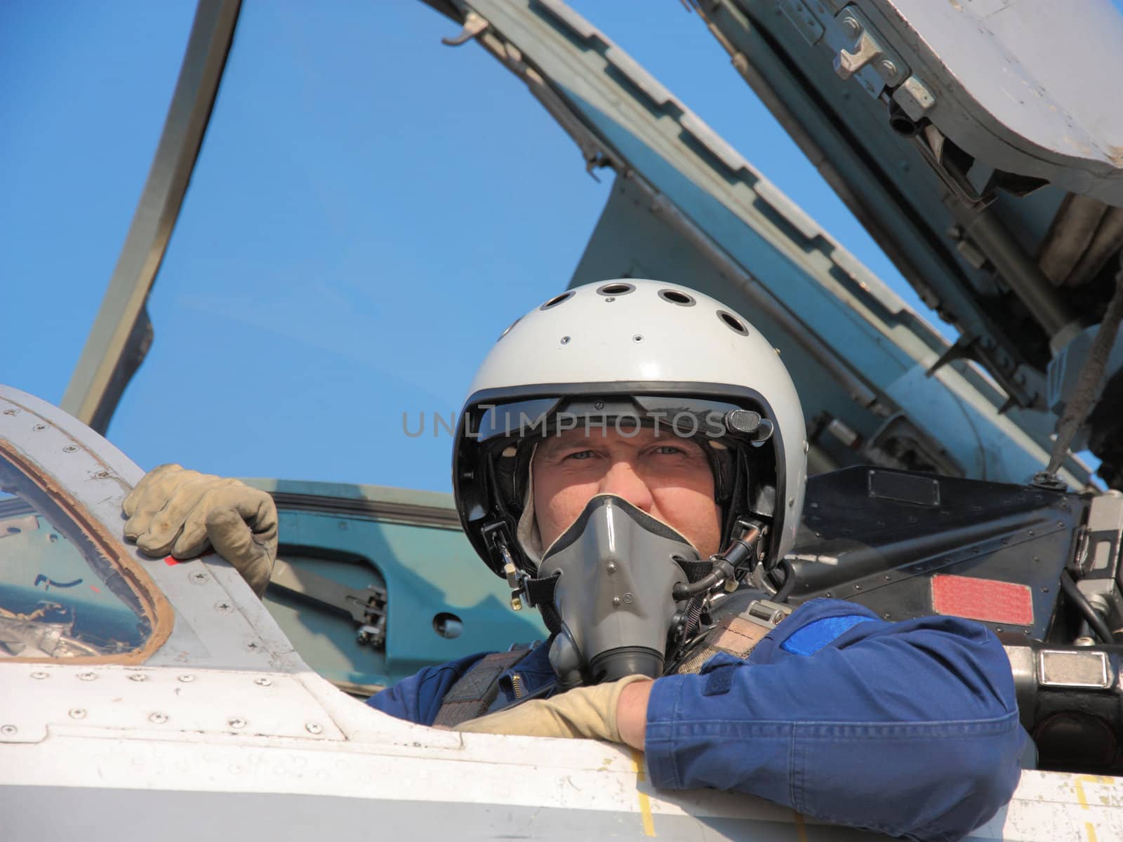military pilot in a helmet on a aircraft