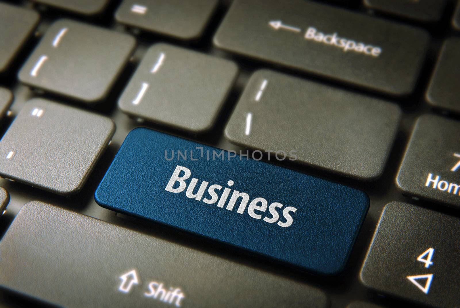 Expand your company with internet: blue key with business word on laptop keyboard. Included clipping path, so you can easily edit it.