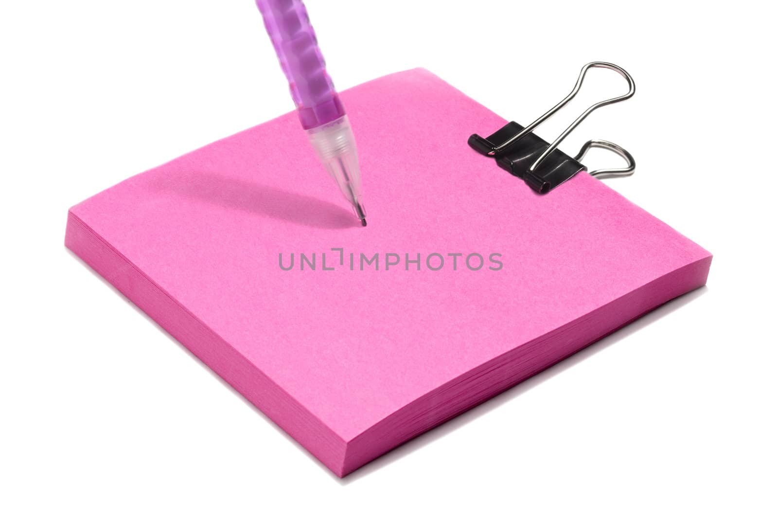 A side view image of a pink post note pad with clip above and a cropped image of a pink pen isolated on