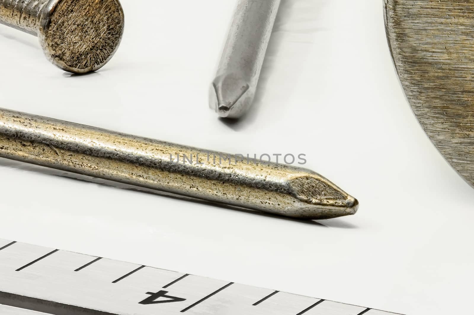 Nails Hammer and Ruler up Close by wolterk