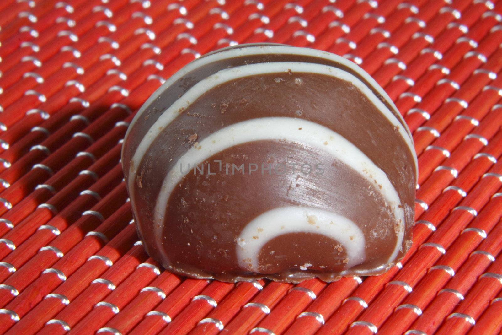 milk chocolate truffle with white choc lines