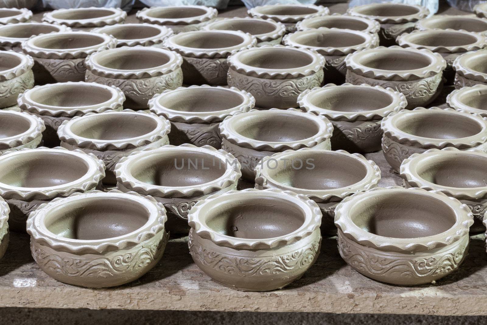 large group of clay pots spread  by jame_j@homail.com