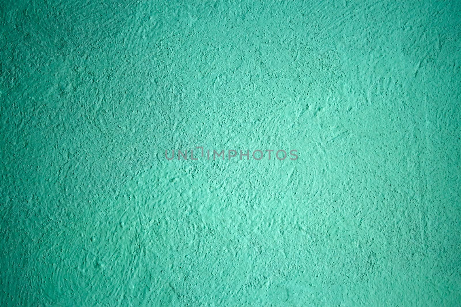 Fragment of painted plaster walls with turquoise tints