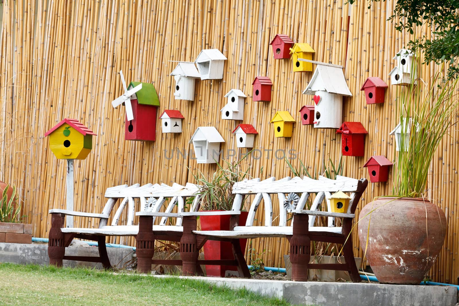 Vintage Bench and Wood wall with Bird's nest