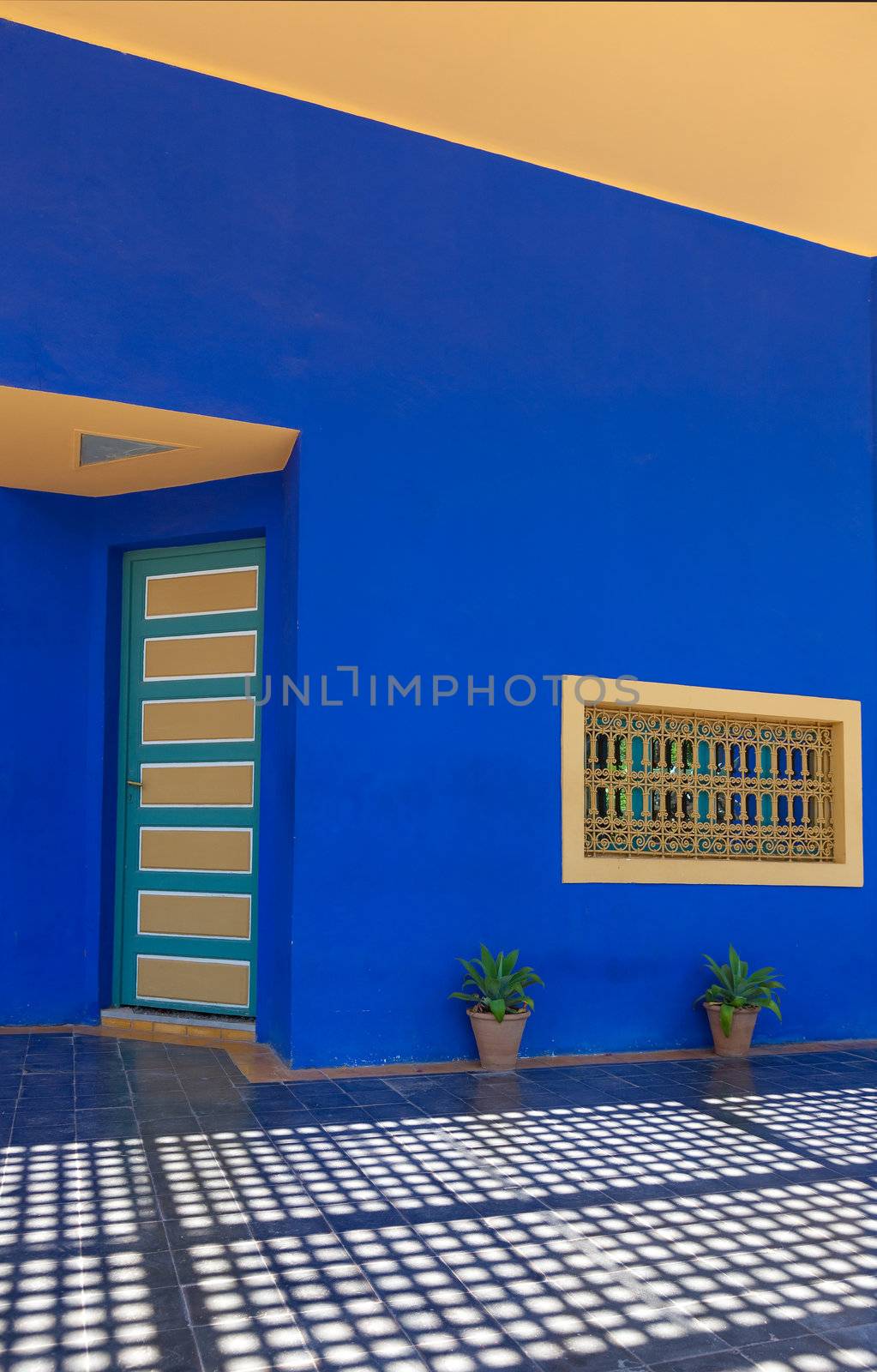 bright color facade house in Morocco.  Marrakesh