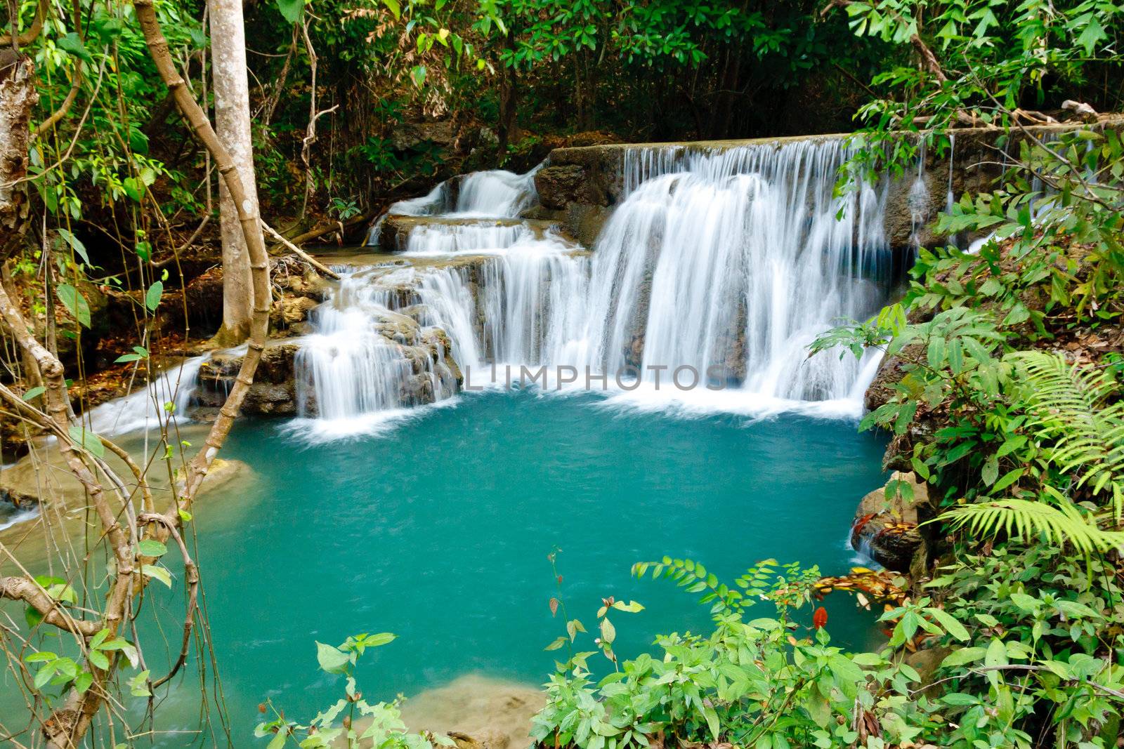 Waterfall in National Park , Kanchanaburi Province , Thailand  by jame_j@homail.com