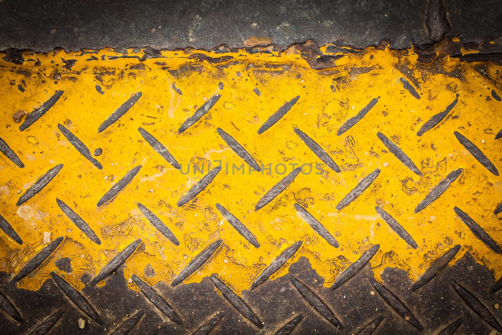 Dark steel floor plate paint with yellow pattern