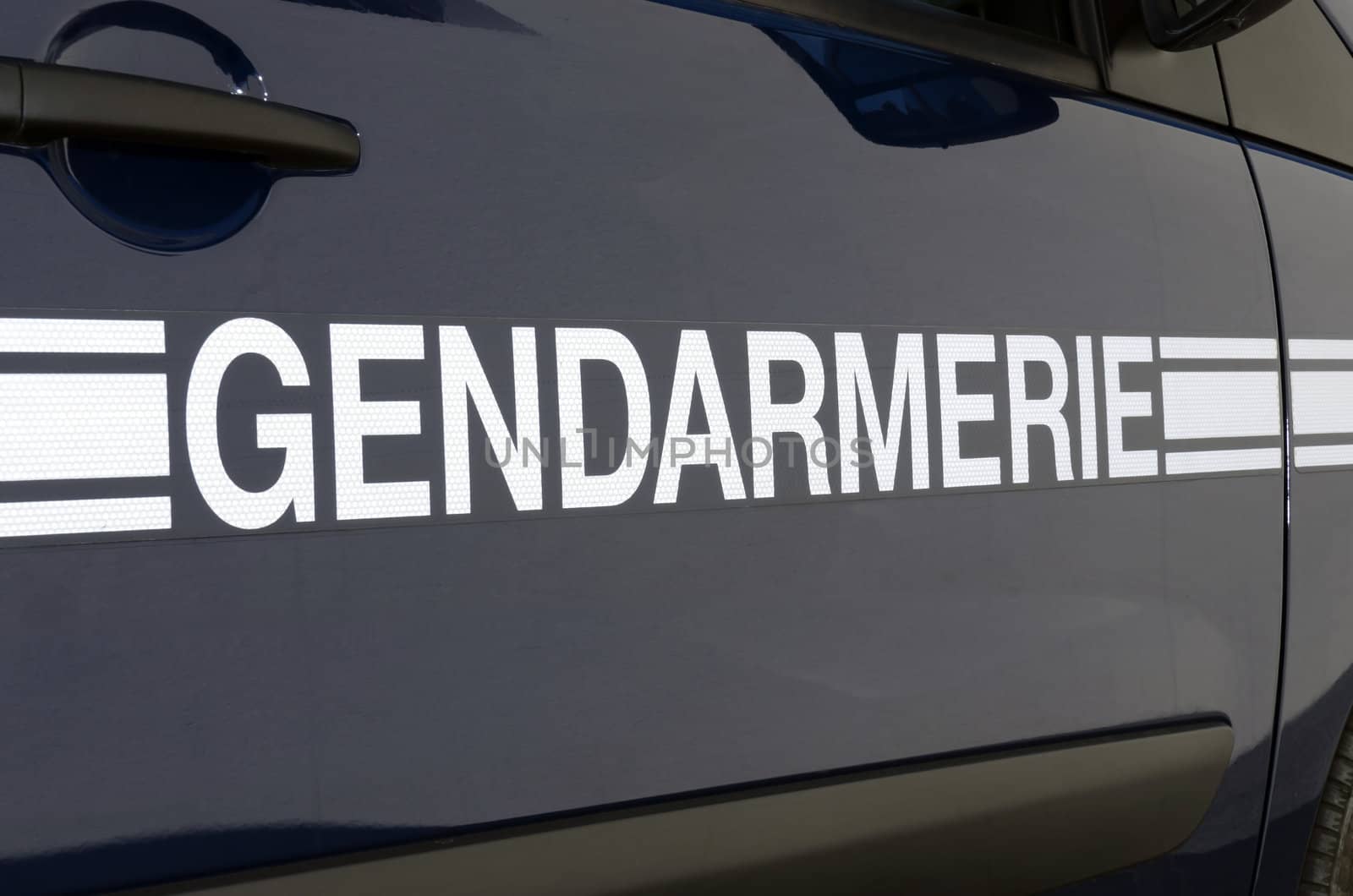 sign on a gendarmerie emergency vehicle, French police