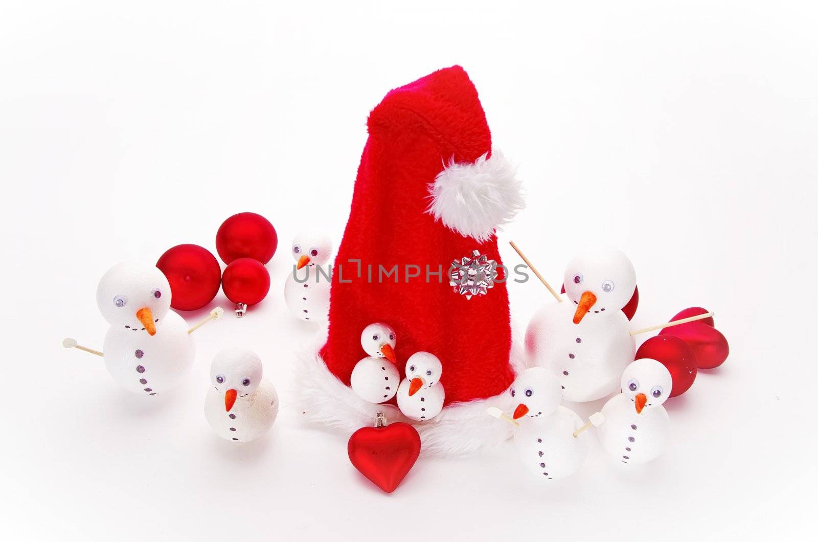 many funny selfmade snowmen isolated on white background