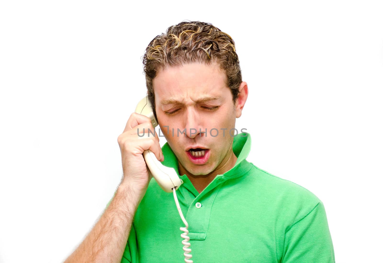 Angry, furious or frustrated guy yelling on the phone