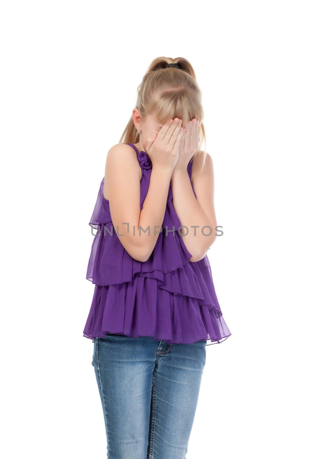 Young girl shyly covered her face with her hands, isolated on white background