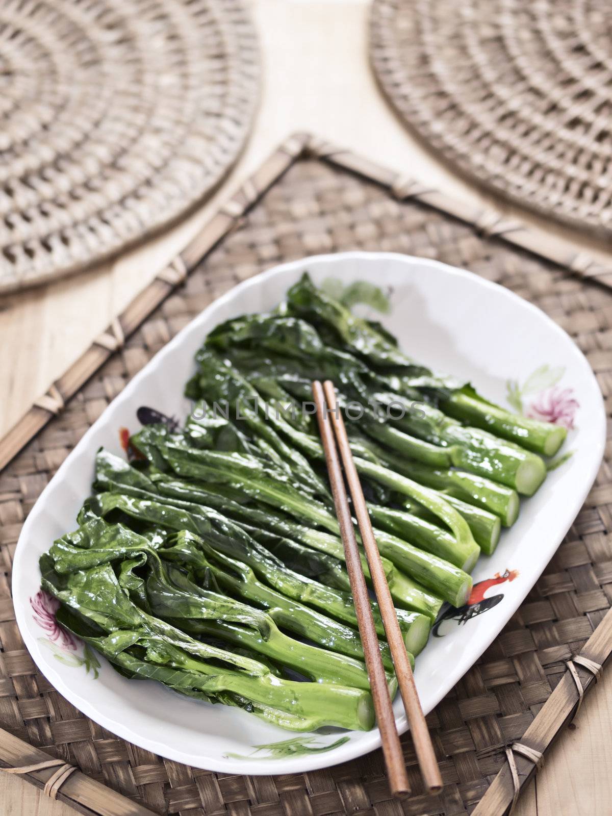 close up of stir fried kai-lan chinese broccoli