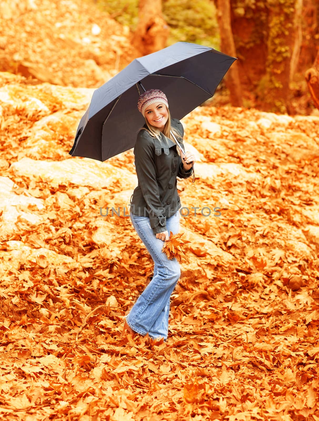 Girl with umbrella in autumn park by Anna_Omelchenko