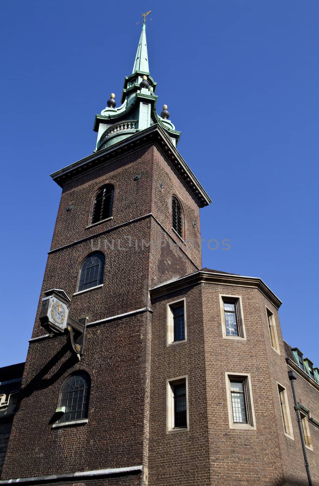 Looking up at All-Hallows-by-the-Tower in London.