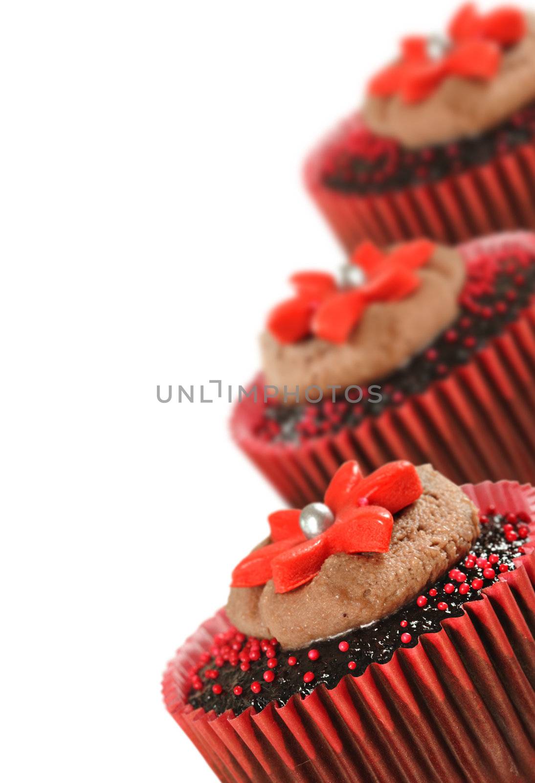 Chocolate cupcakes in red cups by tish1