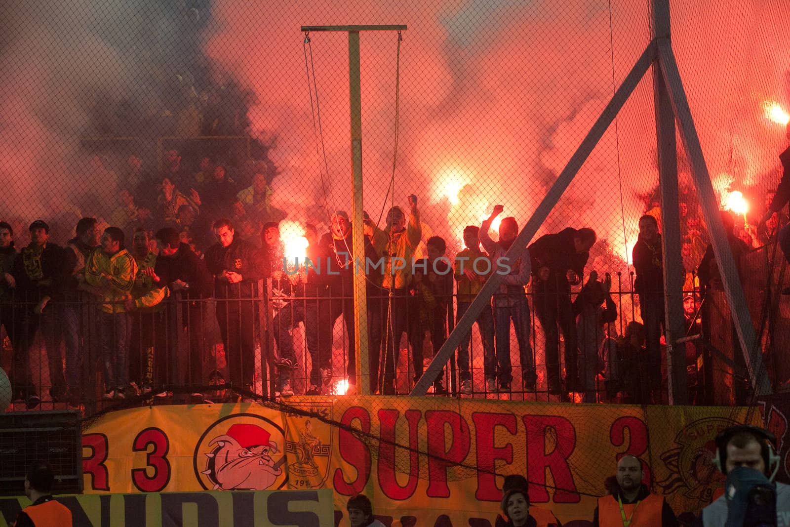 THESSALONIKI, GREECE - OCTOBER 23: Supporters and fans of the team celebrating the Aris team. Paok and Aris (1-1) on October 23, 2011 in Thessaloniki, Greece