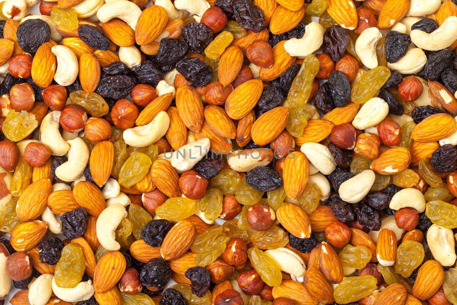 background of mixture of nuts and raisins by Discovod