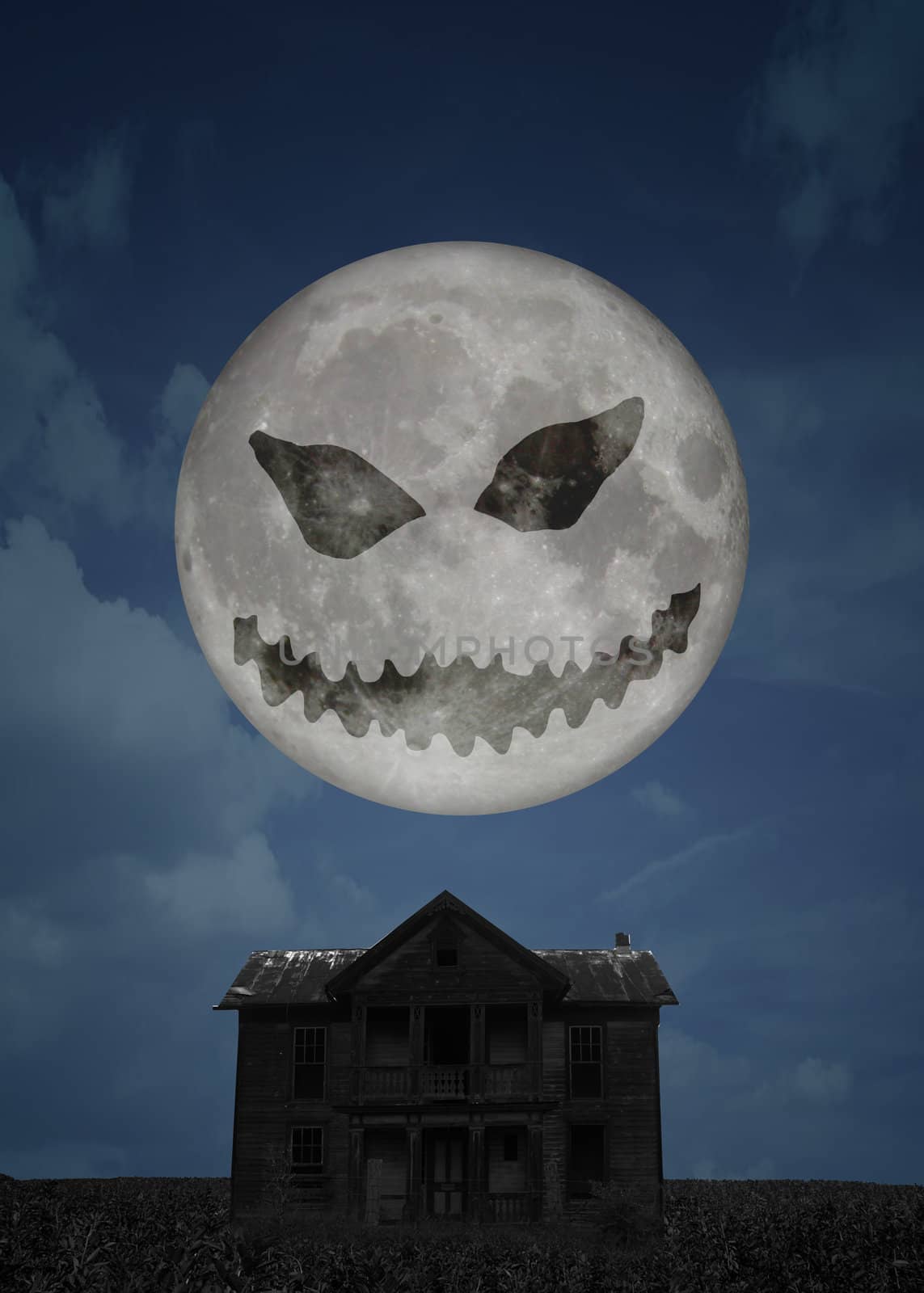 A scary Halloween illustration: Spooky landscape by night with the full moon having a jack-o-lantern face over a creepy dark old house.