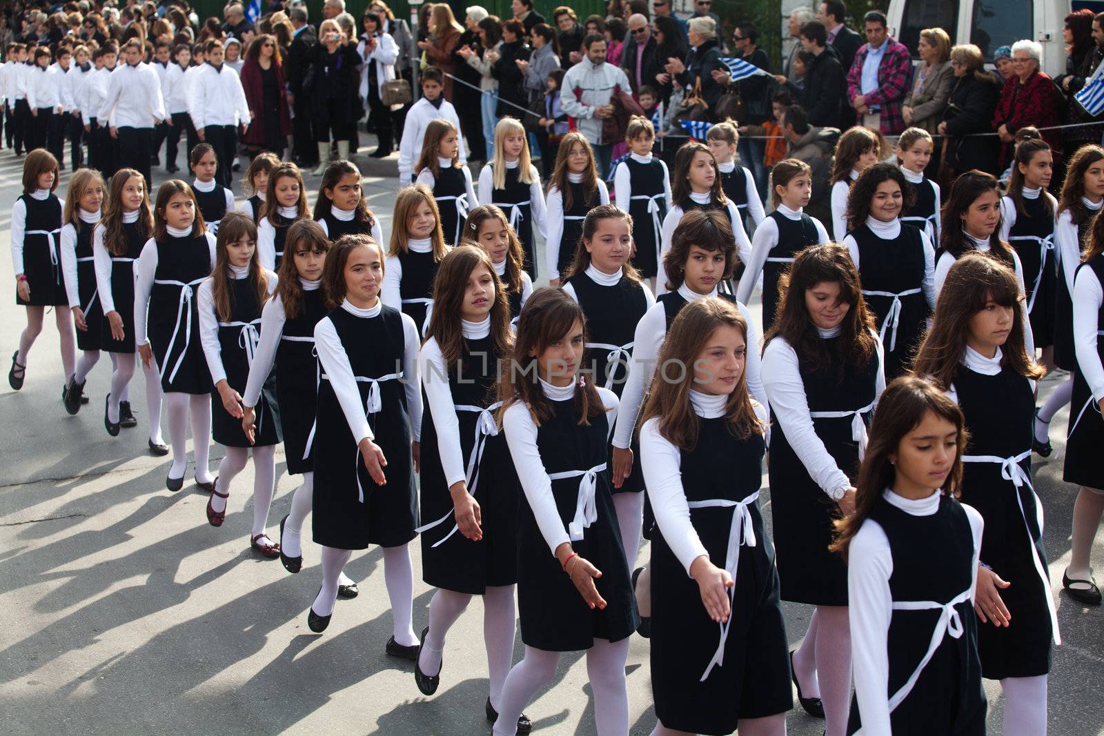 THESSALONIKI, GREECE - OCTOBER 28: Parade to celebrate the anniversary of 1940 which was the military conflict between Greece and Italy.Children holding Greek flags on October 28, 2011 in Thessaloniki