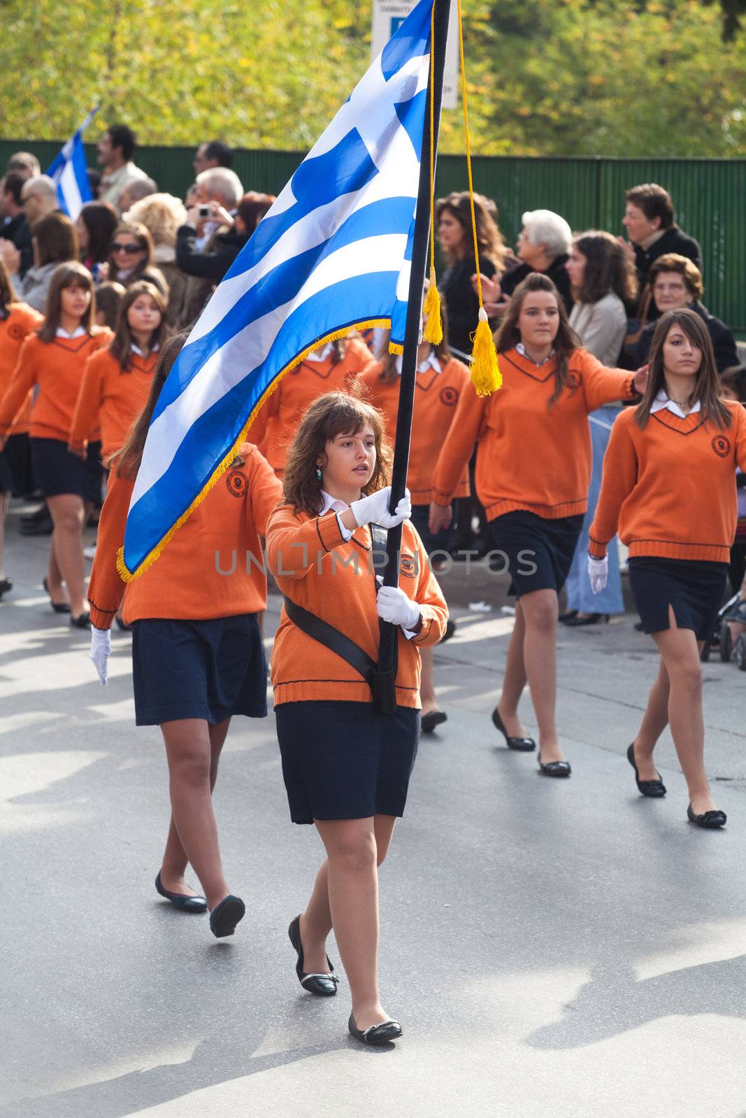 THESSALONIKI, GREECE - OCTOBER 28: Parade to celebrate the anniversary of 1940 which was the military conflict between Greece and Italy.Children holding Greek flags on October 28, 2011 in Thessaloniki