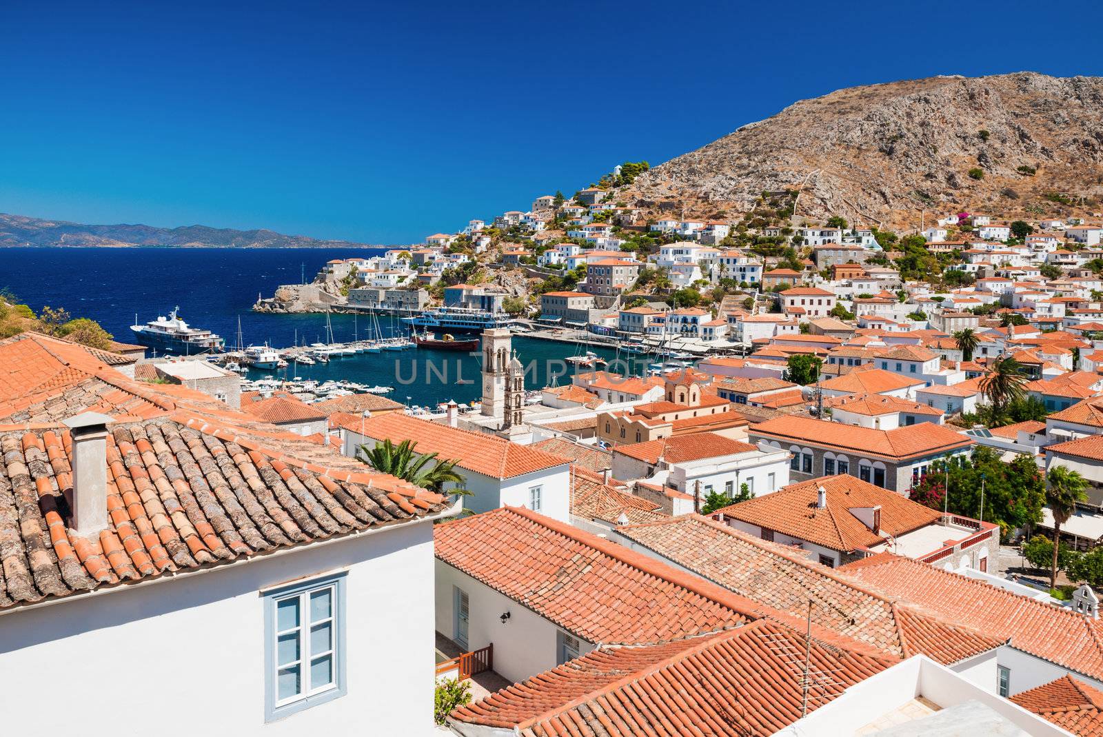 Overview of the beautiful island of Hydra, Greece, showing its main town and port