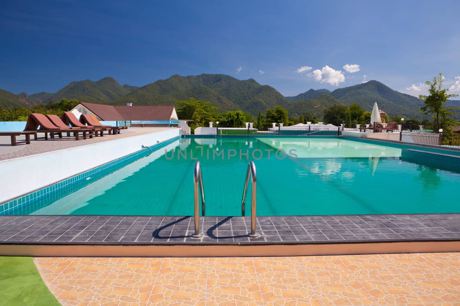 swimming pool besides mountains in Pai Maehongson ,Thailand