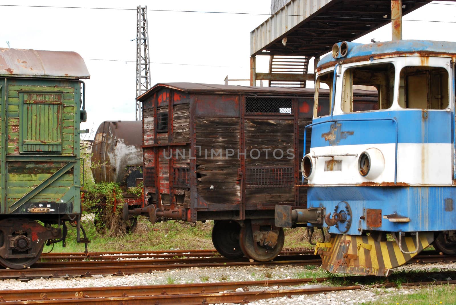Old railway wooden wagons, vintage rail-motor, cistern