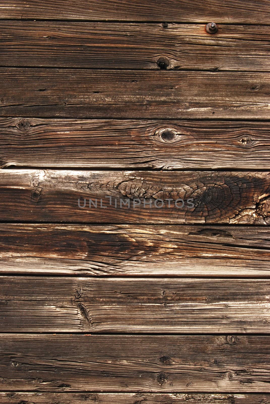 Old weathered wooden boards by varbenov