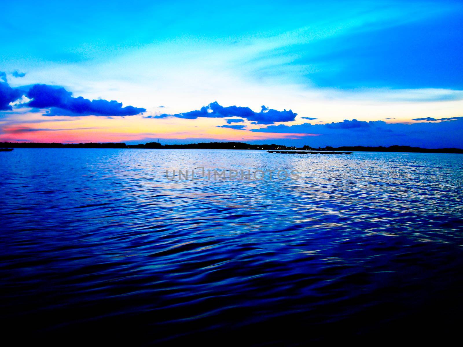 Twilight sunset in the sea by gjeerawut