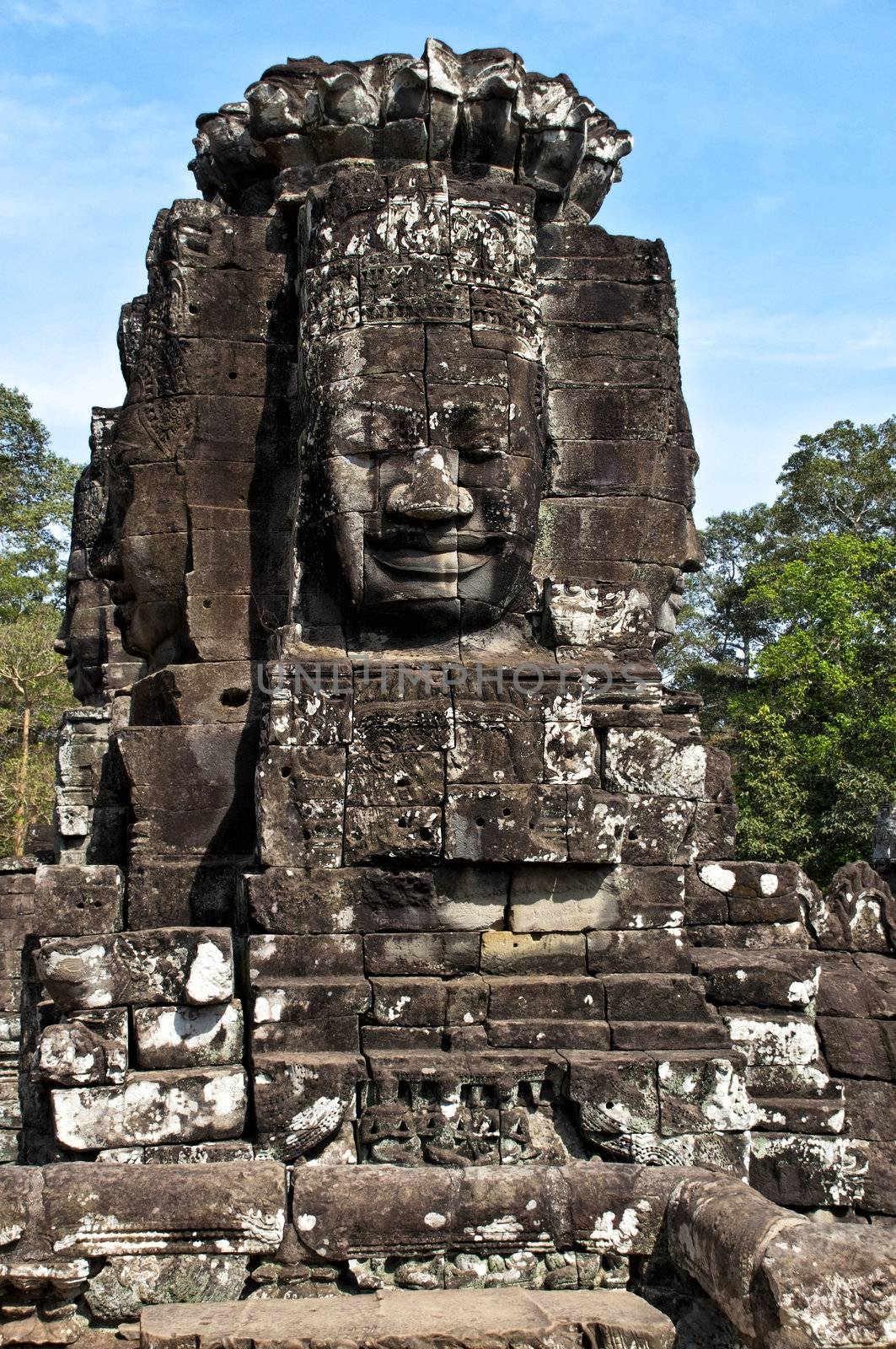 Faces of Bayon temple,Angkor Wat stone carvings of faces,Cambodi by Yuri2012