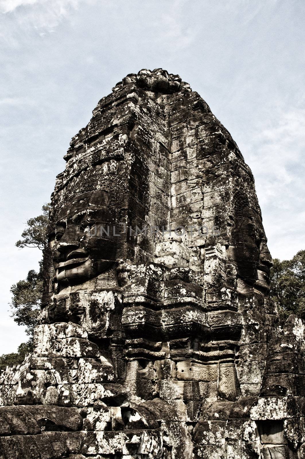 Faces of Bayon temple,Angkor Wat stone carvings of faces,Cambodi by Yuri2012