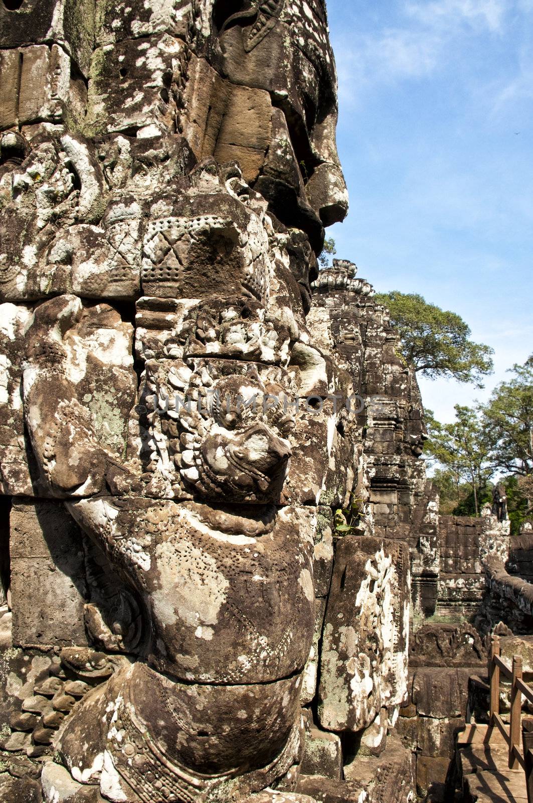 Faces of Bayon temple,Angkor Wat stone carvings of faces,Cambodi by Yuri2012