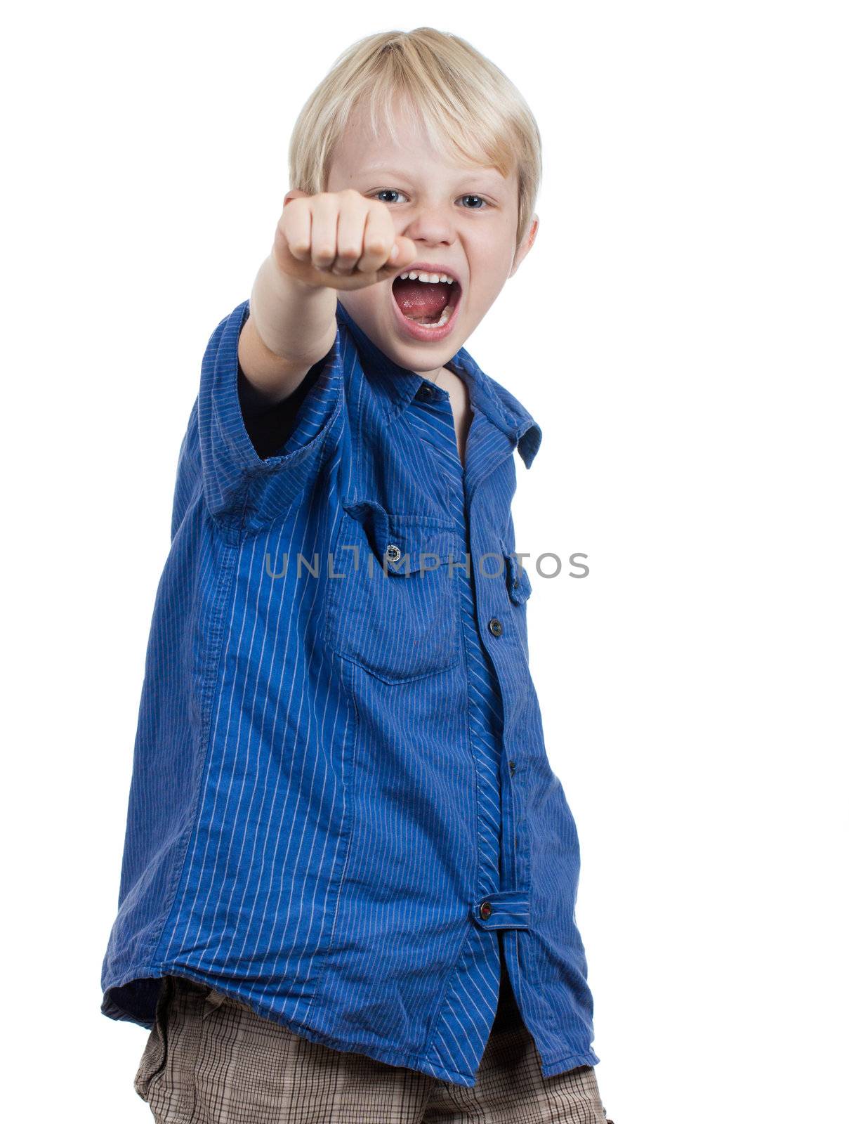 An angry young boy punching and screaming