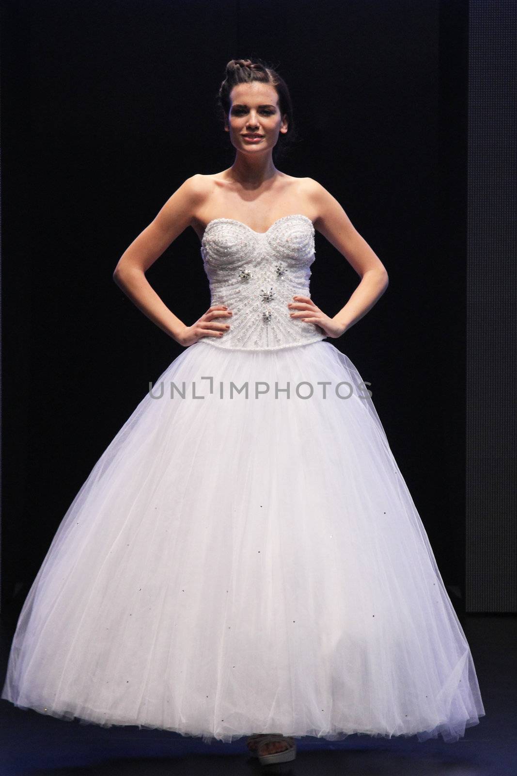 ZAGREB, CROATIA - OCTOBER 27: Fashion model wears wedding dress made by In Atelier Hera on 'Wedding days' show, October 27, 2012 in Zagreb, Croatia.