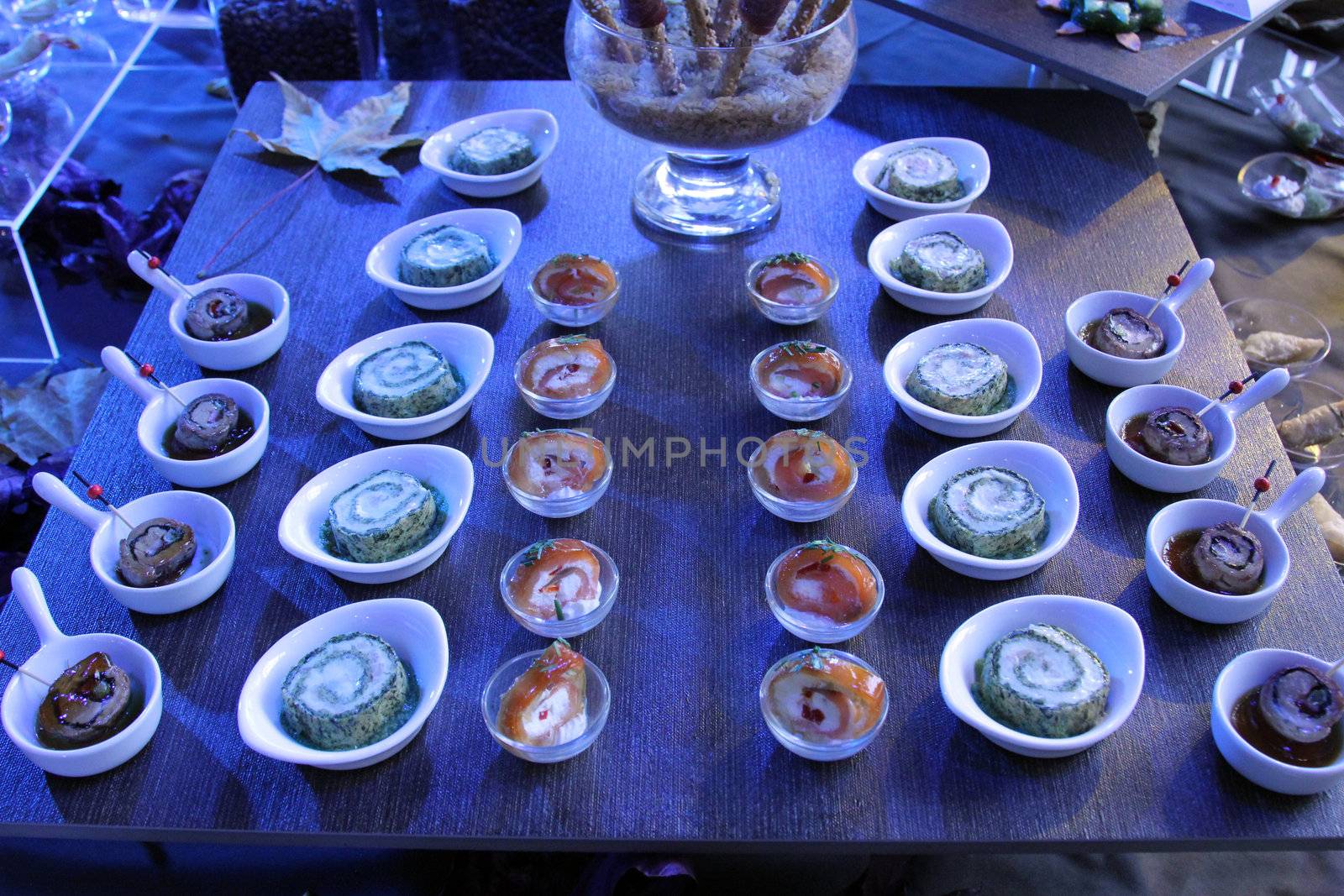 Colorful desserts and pastry served on a wedding party