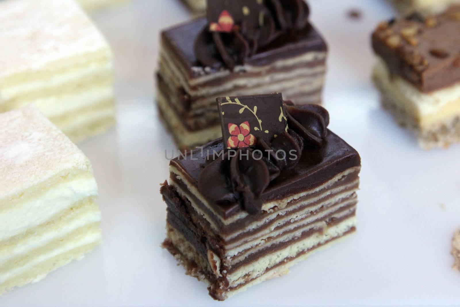 Colorful desserts and pastry served on a wedding party