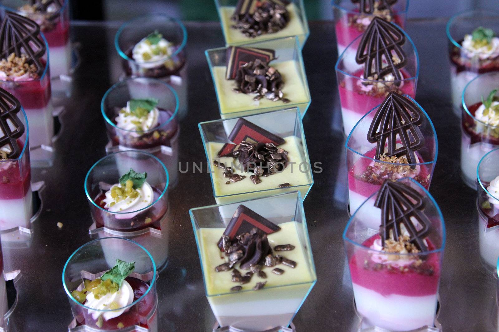 Colorful desserts and pastry served on a wedding party