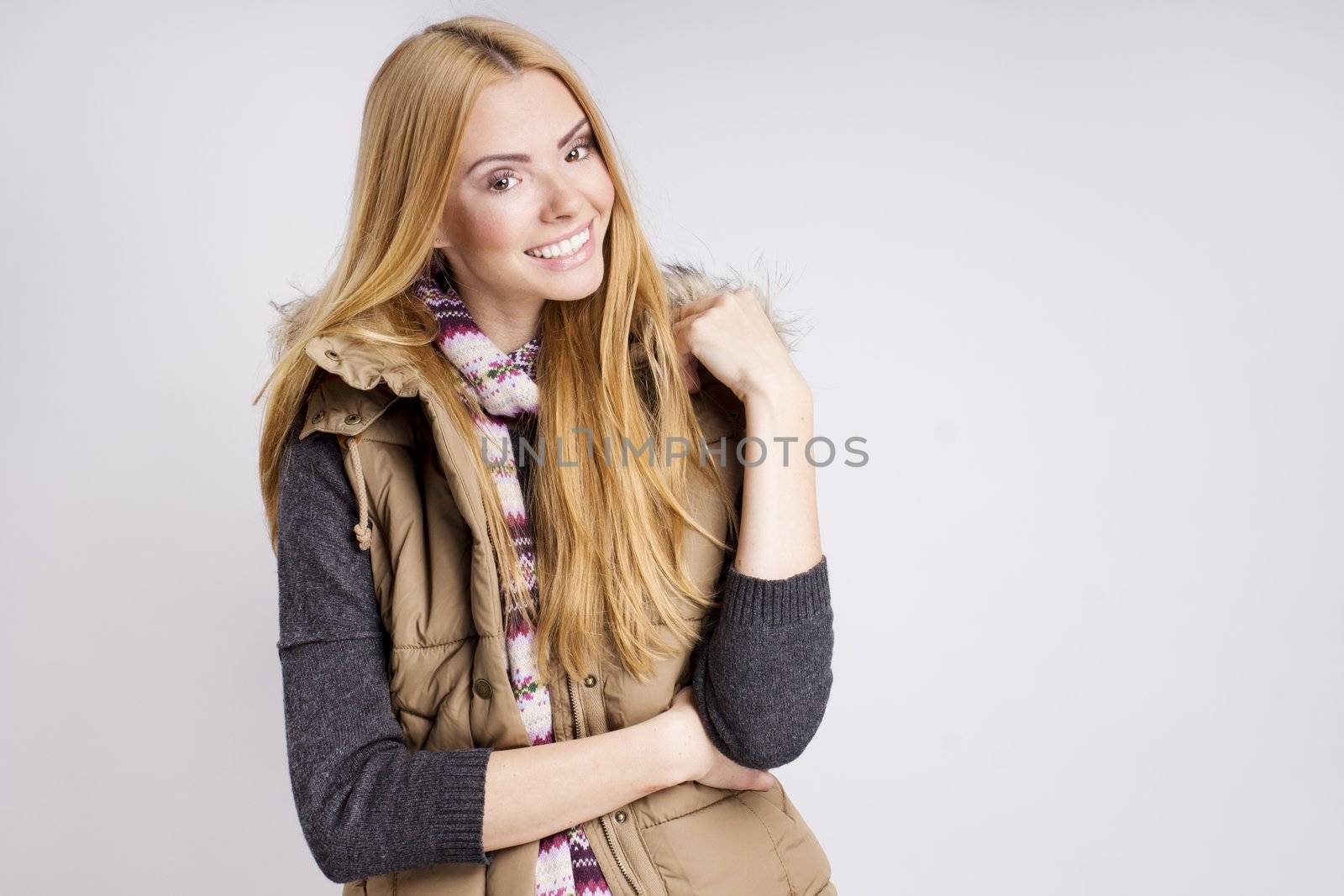 smiling woman in warm clothes by JustineOctop