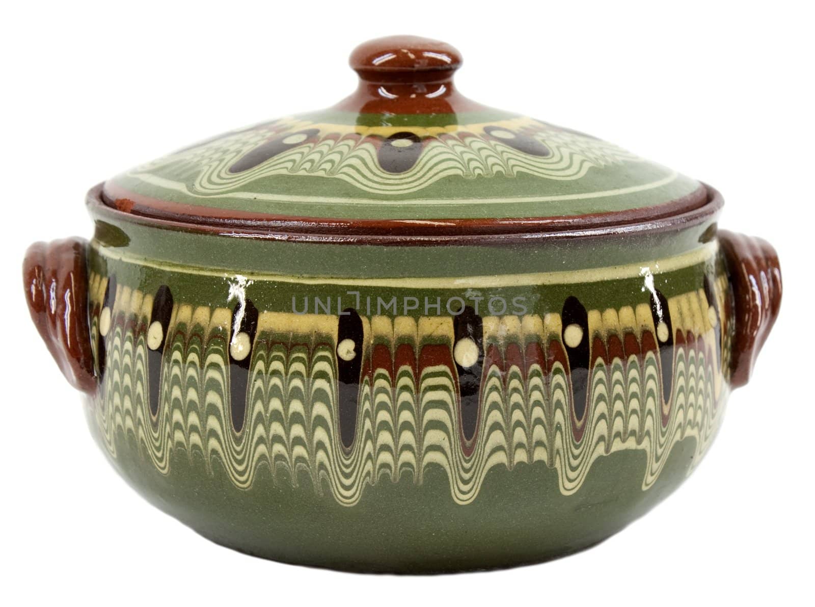 Traditional decorated glazed green clay pot on white