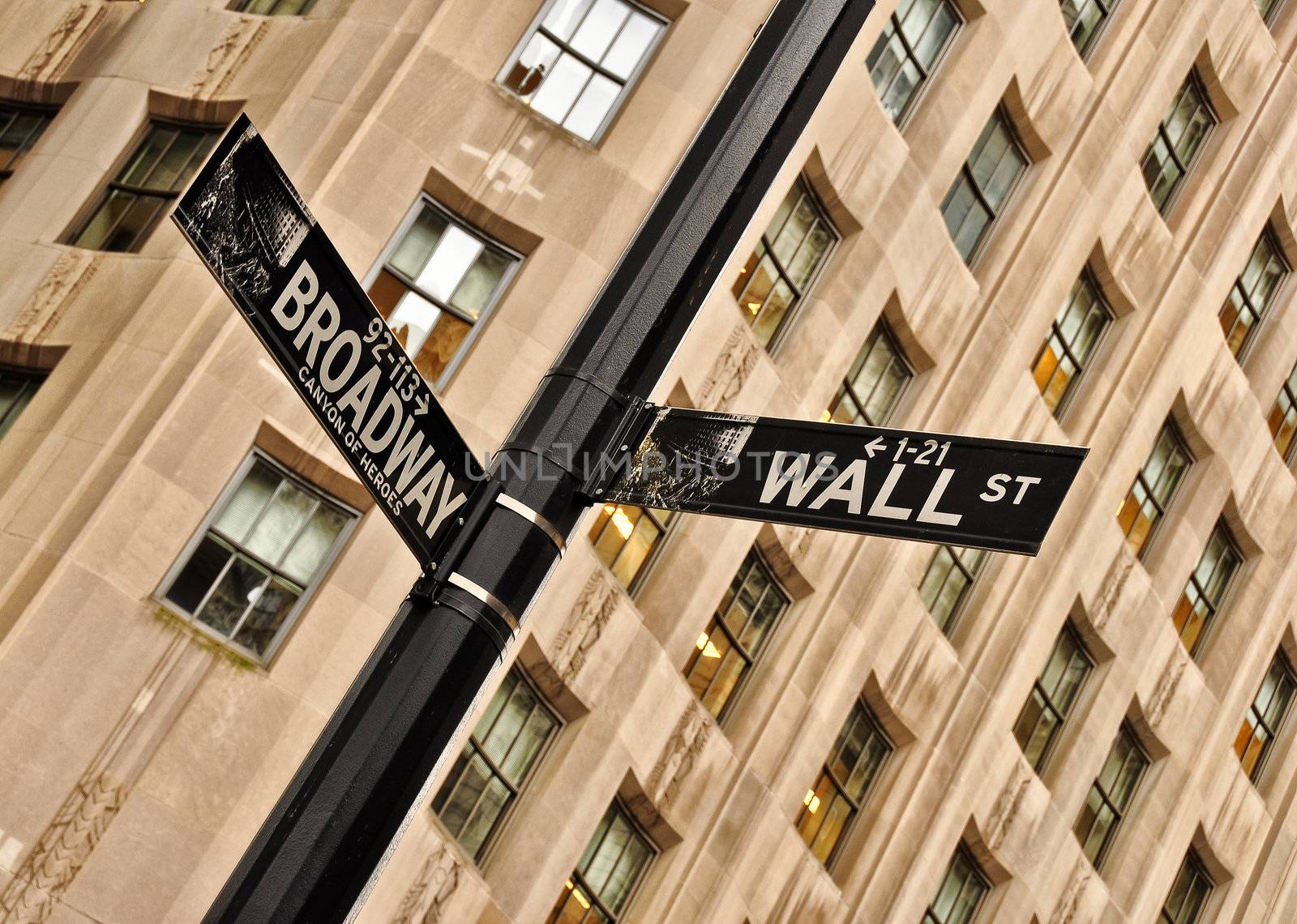 Wall street and Broadway street sign by martinm303