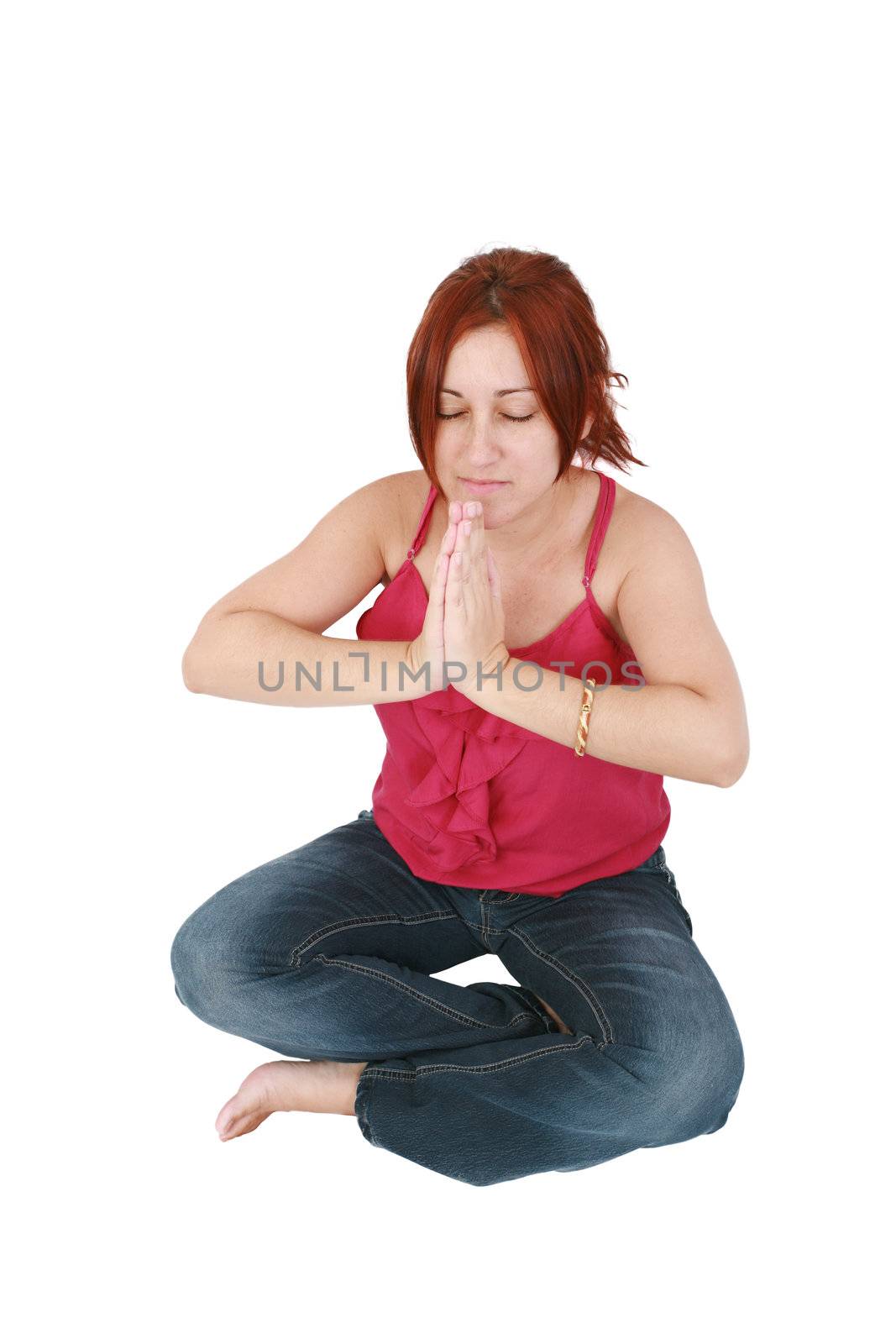 Calm woman doing relaxing yoga exercises