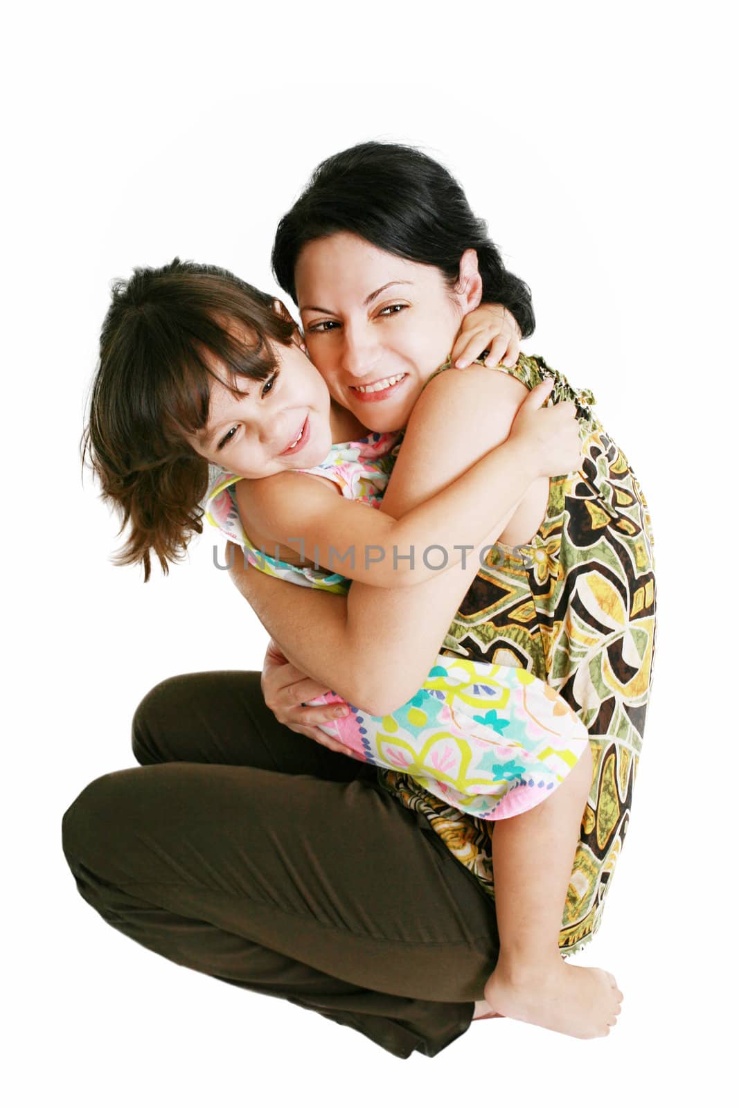 Closeup portrait of mother and daughter in white studio by dacasdo