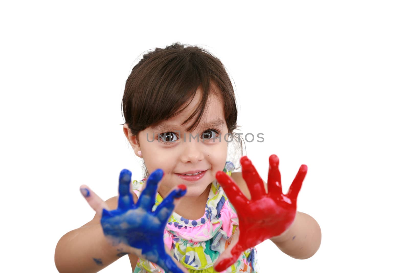 Cute little girl with painted hands. Isolated on white background.