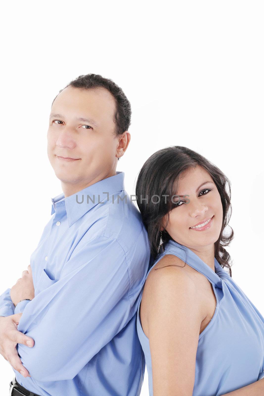 Latin couple smiling isolated on a white background by dacasdo
