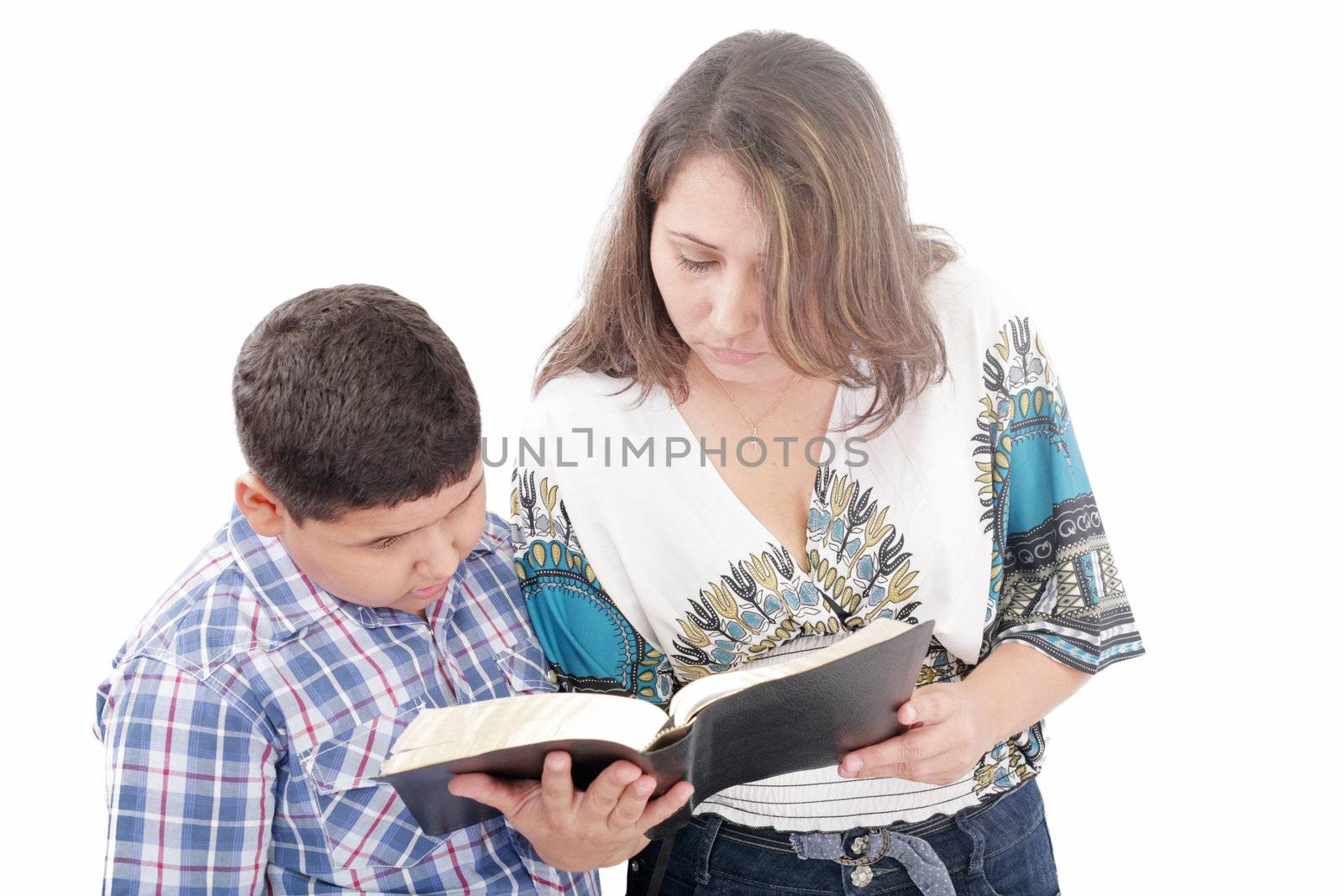 Mother and son reading a Bible over a black background by dacasdo