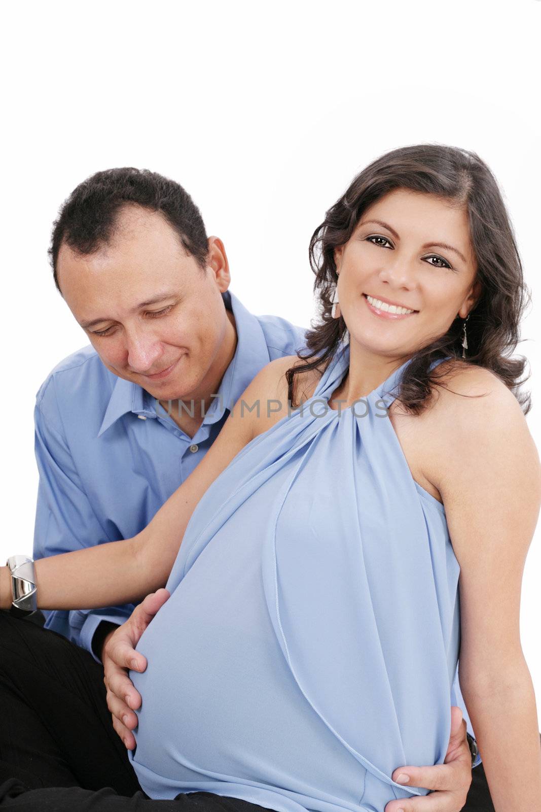 pregnant woman couple together smiling by dacasdo