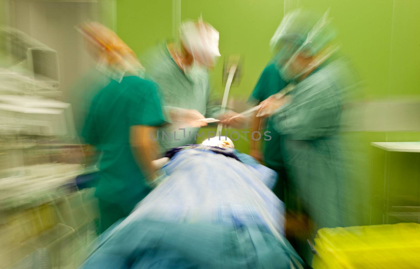 Hospital blurred doctors busy surgery by vilevi
