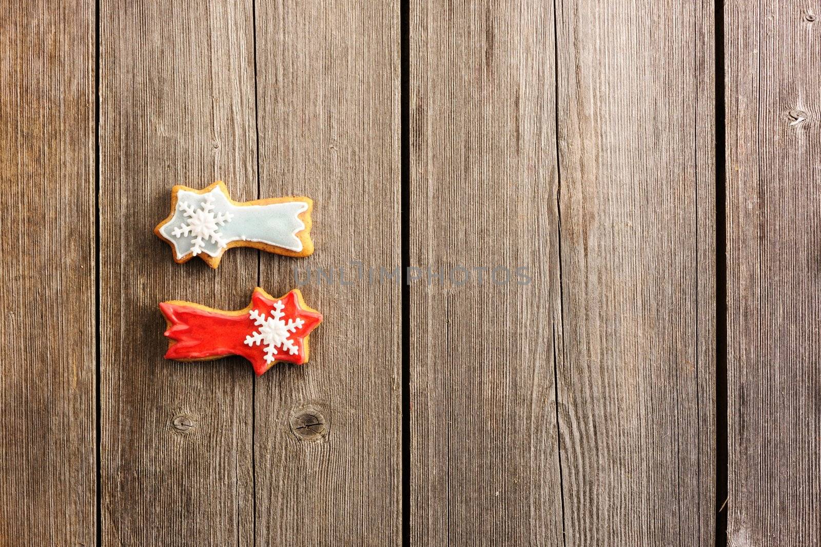 Christmas homemade gingerbread cookie over wooden table